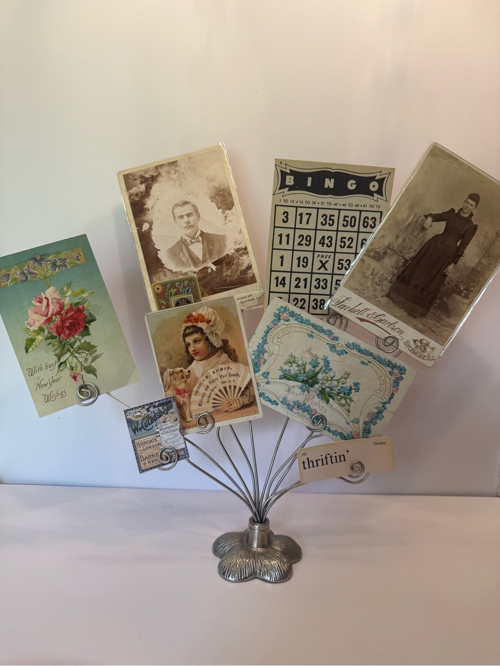 Metal silver photo holder with antique & vintage ephemera photos postcards etc.
